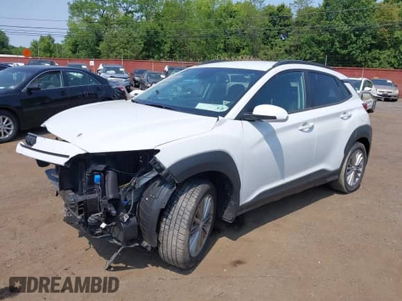 2021 Hyundai Kona SEL z VIN KM8K2CAA9MU615281, wystawiony jako IAAI lot #42403332 z przebiegiem 57 206 mil mil oraz . Historia ofert i sprzedaży dostępna na DreamBid. Obrazek 18.