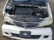 ✅ 2002 Honda Odyssey EX • VIN: 2HKRL18682H551537 • Lot: 84208275. Wystawiony na Copart z przebiegiem 128 632 mil. Bezpłatny archiwum sprzedaży aukcyjnych z USA i szczegółowy raport historii pojazdu na DreamBid. Zdjęcie 12.