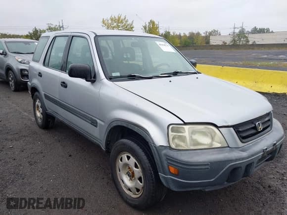 ✅ 2001 Honda CR-V LX • VIN: JHLRD18451C054521 • Lot: 43436731. Listed on IAAI with 130,156 mi. Free auction sales archive from the USA and detailed vehicle history report at DreamBid. Image 12.