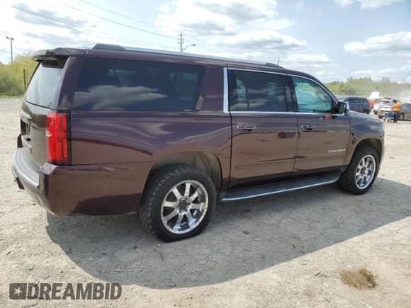 2017 Chevrolet Suburban Premier z VIN 1GNSKJKC4HR288782, wystawiony jako Copart lot #68502444 z przebiegiem 174 498 mil mil oraz Czysty tytuł • Clean title. Historia ofert i sprzedaży dostępna na DreamBid. Obrazek 3.