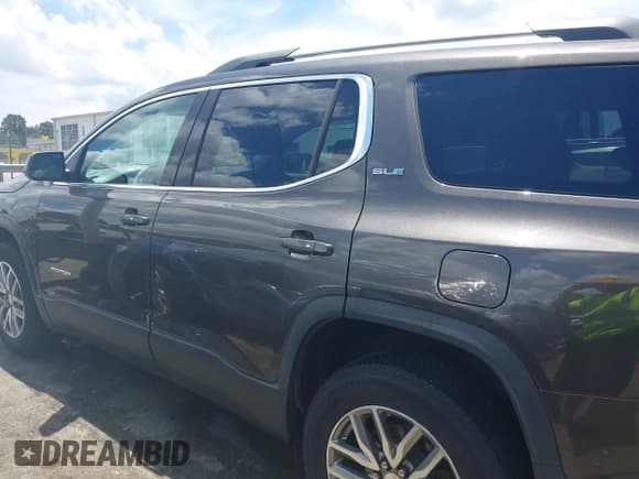 ✅ 2019 GMC Acadia SLE • VIN: 1GKKNLLA2KZ187468 • Lot: 42503104. Listed on IAAI with 156,105 mi. Free auction sales archive from the USA and detailed vehicle history report at DreamBid. Image 14.