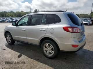 ✅ 2012 Hyundai Santa Fe GLS • VIN: 5XYZGDAB0CG156872 • Лот: 72463214. Размещён на Copart с пробегом 124 528 миль миль. Получите бесплатный доступ к архиву аукционных продаж из США и посмотрите подробный отчёт об истории автомобиля на DreamBid. Изображение 2.