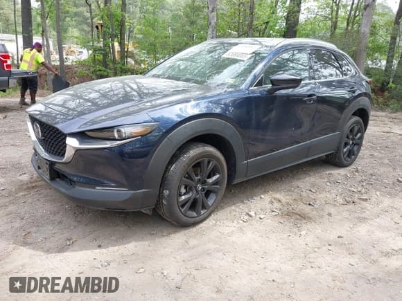 ✅ 2023 Mazda CX-30 Premium • VIN: 3MVDMBDY0PM566361 • Lot: 42080902. Listed on IAAI with 6,938 mi. Free auction sales archive from the USA and detailed vehicle history report at DreamBid. Image 17.