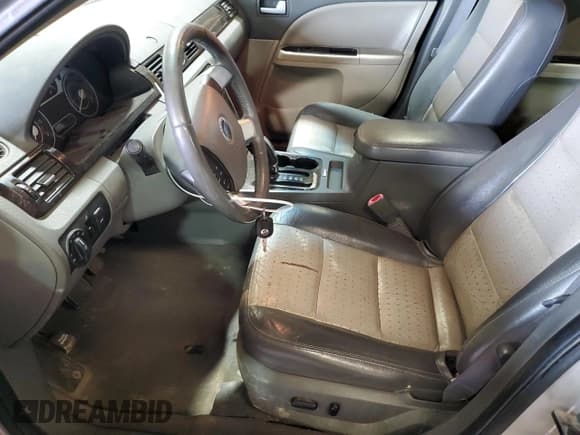 ✅ 2009 Mercury Sable Premier • VIN: 1MEHM42W59G629921 • Лот: 81381405. Опубликован ранее на Copart с пробегом 177 051 миль. Бесплатный доступ к архиву аукционных продаж из США и подробный отчёт об истории автомобиля на DreamBid. Изображение 7.