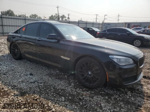 ✅ 2015 BMW 7 Series 750i xDrive • VIN: WBAYB6C56FD225478 • Lot: 67035785. Listed on Copart with 130,037 mi. Free auction sales archive from the USA and detailed vehicle history report at DreamBid. Image 4.