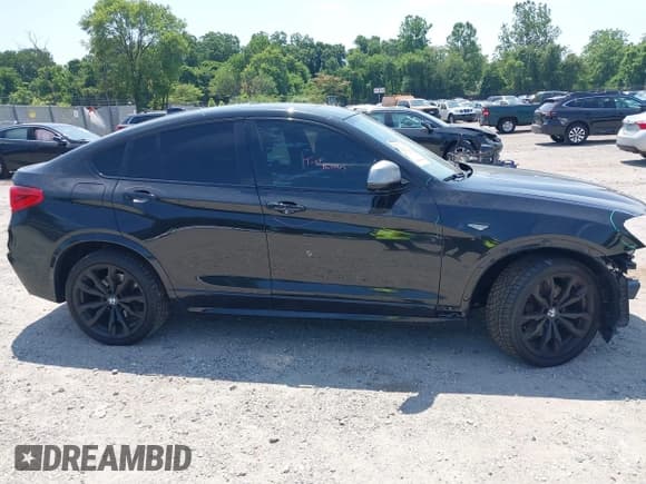 ✅ 2017 BMW X4 M40i • VIN: 5UXXW7C3XH0U26543 • Lot: 42616109. Listed on IAAI with 100,285 mi. Free auction sales archive from the USA and detailed vehicle history report at DreamBid. Image 13.