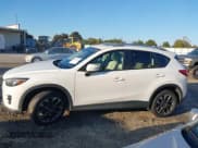✅ 2016 Mazda CX-5 Grand Touring • VIN: JM3KE2DYXG0796487 • Lot: 43624306. Wystawiony na IAAI z przebiegiem 233 746 mil. Bezpłatny archiwum sprzedaży aukcyjnych z USA i szczegółowy raport historii pojazdu na DreamBid. Zdjęcie 14.