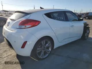 ✅ 2014 Hyundai Veloster • VIN: KMHTC6AD4EU209424 • Lot: 87465194. Wystawiony na Copart z przebiegiem 112 208 mil. Bezpłatny archiwum sprzedaży aukcyjnych z USA i szczegółowy raport historii pojazdu na DreamBid. Zdjęcie 3.