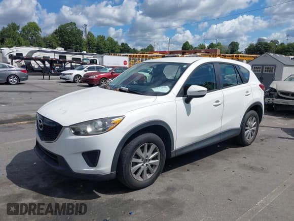 ✅ 2015 Mazda CX-5 Sport • VIN: JM3KE4BY1F0553258 • Lot: 43117276. Wystawiony na IAAI z przebiegiem 90 506 mil. Bezpłatny archiwum sprzedaży aukcyjnych z USA i szczegółowy raport historii pojazdu na DreamBid. Zdjęcie 19.