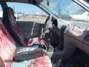 ✅ 1994 Geo Metro • VIN: 2C1MR2465R6726696 • Lot: 42053202. Listed on IAAI with 124,775 mi. Free auction sales archive from the USA and detailed vehicle history report at DreamBid. Image 5.