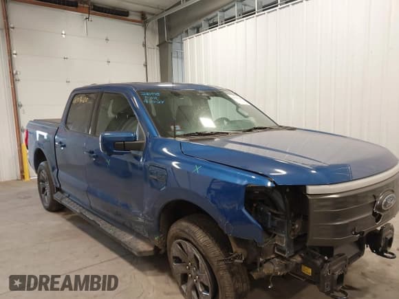 ✅ 2022 Ford F-150 Lightning Pro • VIN: 1FTVW1EL7NWG15923 • Лот: 41396120. Опубликован ранее на IAAI с пробегом 25 322 миль. Бесплатный доступ к архиву аукционных продаж из США и подробный отчёт об истории автомобиля на DreamBid. Изображение 1.