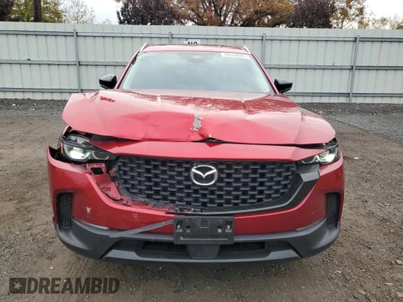 ✅ 2025 Mazda CX-50 S Premium • VIN: 7MMVABDM8SN304632 • Lot: 90594825. Listed on Copart with 17,711 mi. Free auction sales archive from the USA and detailed vehicle history report at DreamBid. Image 5.