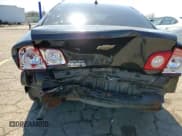 ✅ 2011 Chevrolet Malibu 1LS • VIN: 1G1ZB5E15BF304742 • Lot: 50497734. Listed on Copart with 199,699 mi. Free auction sales archive from the USA and detailed vehicle history report at DreamBid. Image 11.