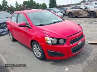 2015 Chevrolet Sonic LT with VIN 1G1JC5SH3F4220819, listed as a IAAI auction lot 43044010 with 121,447 mi miles and . Bid and sale history available at DreamBid. Image 1.