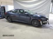 ✅ 2019 Honda Civic EX • VIN: 19XFC1F34KE004958 • Lot: 86621815. Listed on Copart with 36,603 mi. Free auction sales archive from the USA and detailed vehicle history report at DreamBid. Image 4.