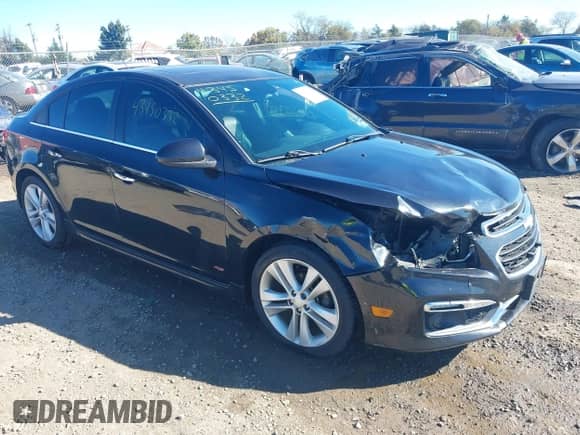 2016 Chevrolet Cruze LTZ z VIN 1G1PG5SB4G7193110, wystawiony jako IAAI lot #43450332 z przebiegiem 176 393 mil mil oraz . Historia ofert i sprzedaży dostępna na DreamBid. Obrazek 1.