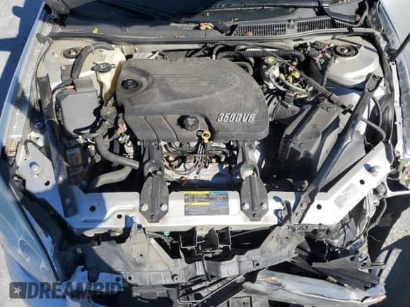 2010 Chevrolet Impala LS with VIN 2G1WA5EK1A1124792, listed as a Copart auction lot 87009105 with 71,419 mi miles and Salvage title. Bid and sale history available at DreamBid. Image 11.