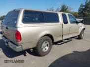 ✅ 1999 Ford F-150 XL • VIN: 1FTRX17L4XKB16941 • Lot: 43818016. Wystawiony na IAAI z przebiegiem Nie podano. Bezpłatny archiwum sprzedaży aukcyjnych z USA i szczegółowy raport historii pojazdu na DreamBid. Zdjęcie 4.