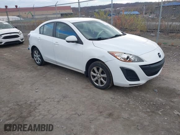 ✅ 2010 Mazda 3 i Touring • VIN: JM1BL1SG3A1284123 • Lot: 43706153. Listed on IAAI with 182,411 mi. Free auction sales archive from the USA and detailed vehicle history report at DreamBid. Image 1.