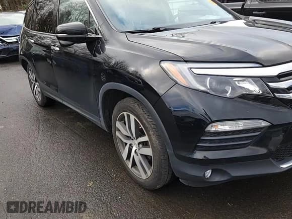 ✅ 2017 Honda Pilot Touring • VIN: 5FNYF6H94HB022653 • Lot: 94408435. Listed on Copart with 74,411 mi. Free auction sales archive from the USA and detailed vehicle history report at DreamBid. Image 14.