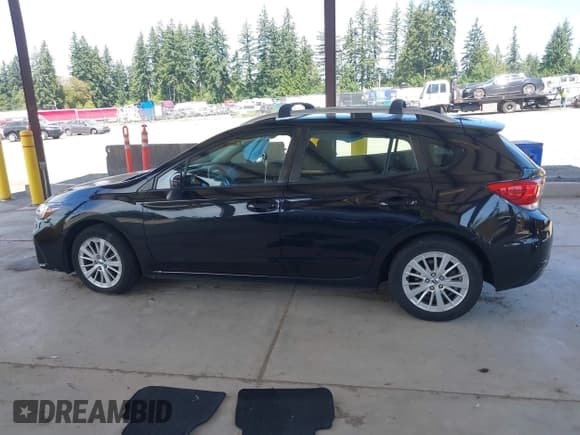 ✅ 2017 Subaru Impreza Premium • VIN: 4S3GTAB64H3740061 • Lot: 43033499. Listed on IAAI with 115,173 mi. Free auction sales archive from the USA and detailed vehicle history report at DreamBid. Image 14.