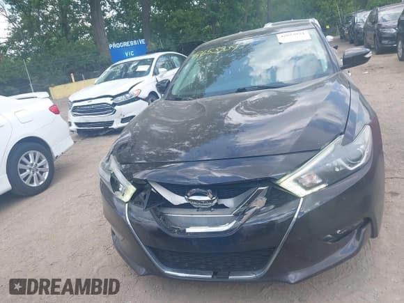 ✅ 2016 Nissan Maxima Platinum • VIN: 1N4AA6AP4GC409861 • Lot: 42653934. Listed on IAAI with 147,493 mi. Free auction sales archive from the USA and detailed vehicle history report at DreamBid. Image 12.