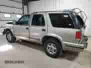 1999 Chevrolet Blazer LS with VIN 1GNDT13W9X2105768, listed as a Copart auction lot 80141174 with 193,804 mi miles and Salvage title. Bid and sale history available at DreamBid. Image 2.