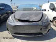 ✅ 2023 Tesla Model Y • VIN: 7SAYGDED7PF963865 • Lot: 69295755. Listed on Copart with 11,750 mi. Free auction sales archive from the USA and detailed vehicle history report at DreamBid. Image 5.