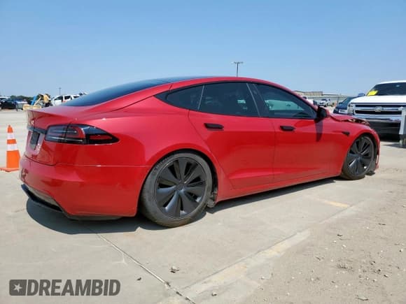 ✅ 2022 Tesla Model S • VIN: 5YJSA1E51NF492742 • Lot: 71975975. Listed on Copart with 50,469 mi. Free auction sales archive from the USA and detailed vehicle history report at DreamBid. Image 3.
