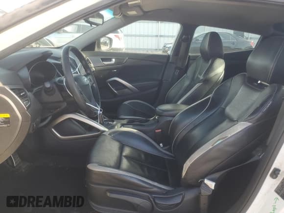 ✅ 2013 Hyundai Veloster Turbo • VIN: KMHTC6AE0DU176736 • Lot: 82283314. Wystawiony na Copart z przebiegiem 150 974 mil. Bezpłatny archiwum sprzedaży aukcyjnych z USA i szczegółowy raport historii pojazdu na DreamBid. Zdjęcie 7.