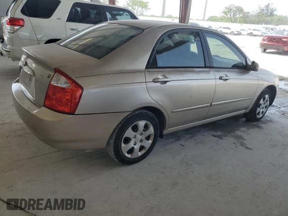 ✅ 2004 Kia Spectra LX • VIN: KNAFE121145030119 • Lot: 59522355. Listed on Copart with 86,264 mi. Free auction sales archive from the USA and detailed vehicle history report at DreamBid. Image 3.