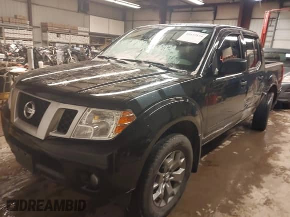 2020 Nissan Frontier SV with VIN 1N6ED0EBXLN710208, listed as a IAAI auction lot 41137154 with 28,760 mi miles and . Bid and sale history available at DreamBid. Image 2.