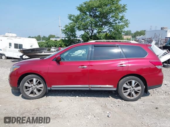 ✅ 2015 Nissan Pathfinder Platinum • VIN: 5N1AR2MM9FC653285 • Lot: 42810357. Listed on IAAI with 82,800 mi. Free auction sales archive from the USA and detailed vehicle history report at DreamBid. Image 14.