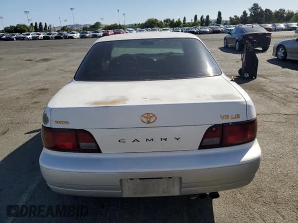 ✅ 1996 Toyota Camry LE • VIN: JT2BF12K3T0139807 • Lot: 57675855. Listed on Copart with 258,601 mi. Free auction sales archive from the USA and detailed vehicle history report at DreamBid. Image 6.