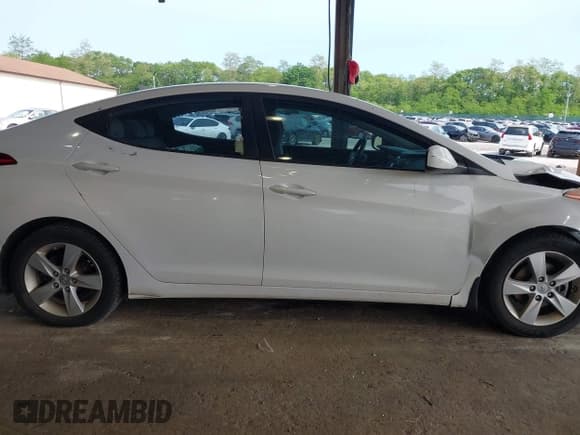 ✅ 2013 Hyundai Elantra GLS • VIN: 5NPDH4AE9DH392979 • Lot: 42394974. Listed on IAAI with 69,077 mi. Free auction sales archive from the USA and detailed vehicle history report at DreamBid. Image 13.