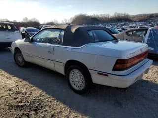 ✅ 1993 Chrysler LeBaron • VIN: 1C3XU4534PF654847 • Lot: 84391684. Wystawiony na Copart z przebiegiem 129 520 mil. Bezpłatny archiwum sprzedaży aukcyjnych z USA i szczegółowy raport historii pojazdu na DreamBid. Zdjęcie 2.