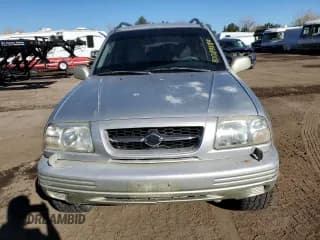 ✅ 1999 Suzuki Grand Vitara JLX • VIN: JS3TD62V0X4113058 • Lot: 80089884. Listed on Copart with 165,794 mi. Free auction sales archive from the USA and detailed vehicle history report at DreamBid. Image 5.