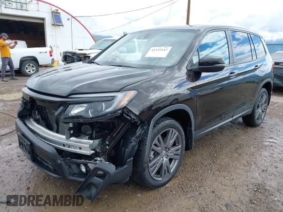 ✅ 2021 Honda Passport EX-L • VIN: 5FNYF8H51MB019230 • Lot: 42332147. Listed on IAAI with 36,733 mi. Free auction sales archive from the USA and detailed vehicle history report at DreamBid. Image 2.
