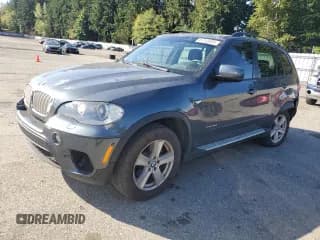 ✅ 2012 BMW X5 35d • VIN: 5UXZW0C5XCL667950 • Lot: 81743995. Listed on Copart with 147,555 mi. Free auction sales archive from the USA and detailed vehicle history report at DreamBid. Image 1.