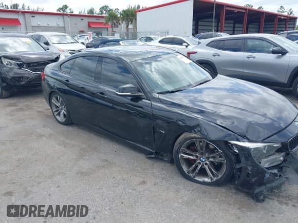 ✅ 2015 BMW 4 Series 428i xDrive • VIN: WBA4A7C55FD414405 • Lot: 39159752. Listed on IAAI with 121,009 mi. Free auction sales archive from the USA and detailed vehicle history report at DreamBid. Image 1.