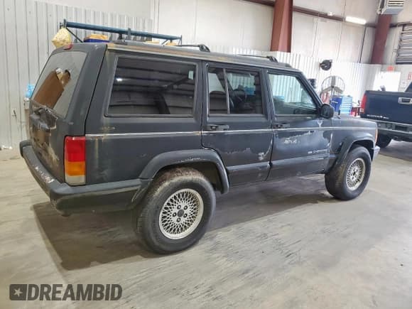 ✅ 1999 Jeep Cherokee Limited • VIN: 1J4FF78S1XL591580 • Lot: 92581565. Listed on Copart with 173,128 mi. Free auction sales archive from the USA and detailed vehicle history report at DreamBid. Image 3.