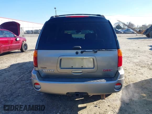 ✅ 2003 GMC Envoy SLE • VIN: 1GKES16S536164428 • Lot: 41728922. Listed on IAAI with 268,309 mi. Free auction sales archive from the USA and detailed vehicle history report at DreamBid. Image 16.