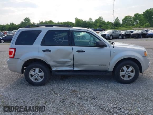 ✅ 2008 Ford Escape XLT • VIN: 1FMCU93128KC01646 • Lot: 42372522. Listed on IAAI with 211,988 mi. Free auction sales archive from the USA and detailed vehicle history report at DreamBid. Image 13.