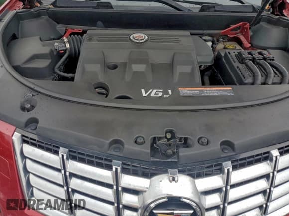 ✅ 2013 Cadillac SRX Premium Collection • VIN: 3GYFNEE32DS571350 • Лот: 93913195. Опубликован ранее на Copart с пробегом 137 113 миль. Бесплатный доступ к архиву аукционных продаж из США и подробный отчёт об истории автомобиля на DreamBid. Изображение 12.