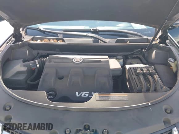 ✅ 2014 Cadillac SRX • VIN: 3GYFNAE35ES627243 • Lot: 42355141. Wystawiony na IAAI z przebiegiem 99 885 mil. Bezpłatny archiwum sprzedaży aukcyjnych z USA i szczegółowy raport historii pojazdu na DreamBid. Zdjęcie 10.