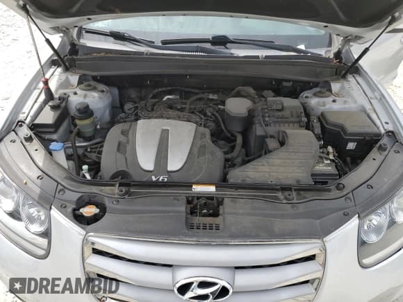 ✅ 2012 Hyundai Santa Fe Limited • VIN: 5XYZK4AG9CG161532 • Lot: 70388424. Listed on Copart with 75,794 mi. Free auction sales archive from the USA and detailed vehicle history report at DreamBid. Image 12.