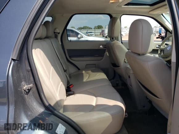 ✅ 2010 Mercury Mariner Premier • VIN: 4M2CN9HG7AKJ26845 • Lot: 66954244. Wystawiony na Copart z przebiegiem 168 204 mil. Bezpłatny archiwum sprzedaży aukcyjnych z USA i szczegółowy raport historii pojazdu na DreamBid. Zdjęcie 11.