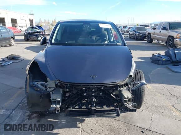 ✅ 2023 Tesla Model Y • VIN: 7SAYGDED5PF980132 • Lot: 43573118. Listed on IAAI with 30,165 mi. Free auction sales archive from the USA and detailed vehicle history report at DreamBid. Image 13.