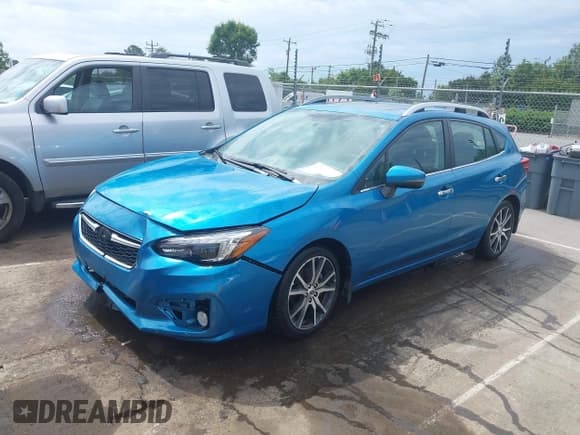 ✅ 2019 Subaru Impreza Limited • VIN: 4S3GTAU64K3709025 • Lot: 42295152. Listed on IAAI with 33,185 mi. Free auction sales archive from the USA and detailed vehicle history report at DreamBid. Image 2.