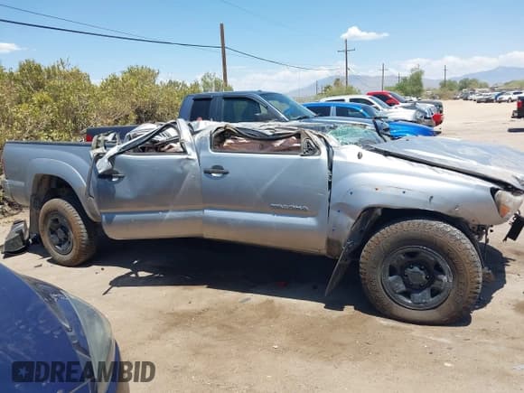 ✅ 2015 Toyota Tacoma PreRunner • VIN: 5TFKU4HNXFX005985 • Lot: 42583474. Listed on IAAI with 160,000 mi. Free auction sales archive from the USA and detailed vehicle history report at DreamBid. Image 13.